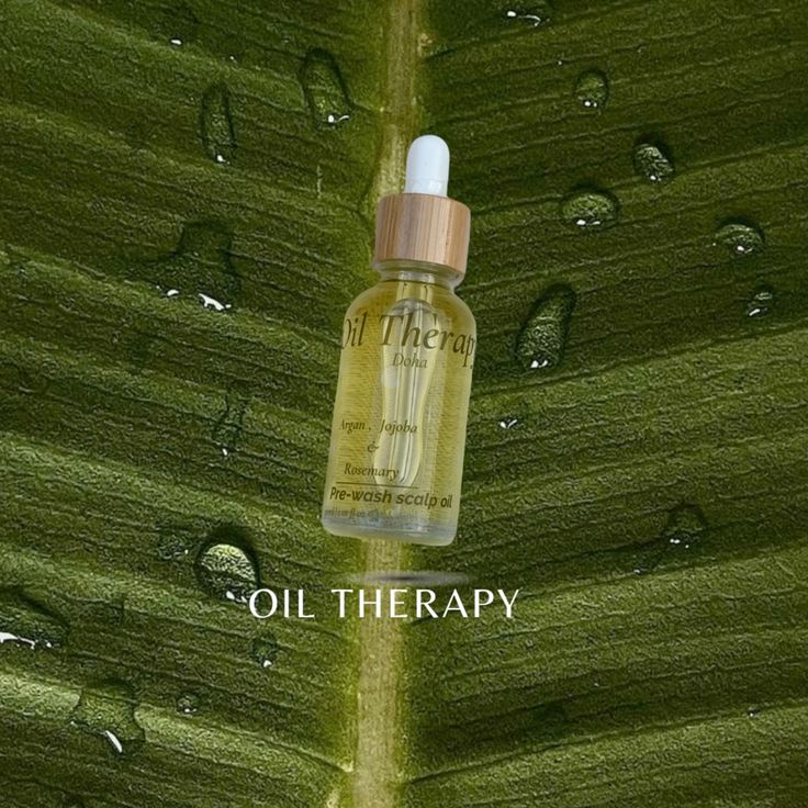 Rub the scalp with warm oil​